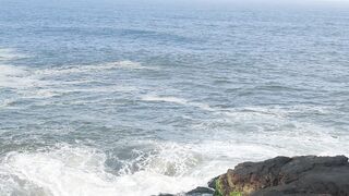 Lord Shiva sitting near sea