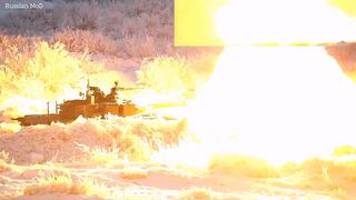 Russian troops carry out tank and artillery drills in harsh winter conditions