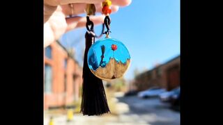 Beautiful Resin pendant, using lanugo, dried flowers and wood