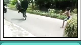 The impudent child suddenly stopped the man who was driving the motorbike