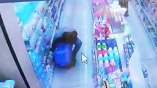 Shoplifting in a mini-market in cctv