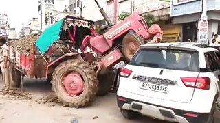 Accident between tractor and car near SBI Bank on Dungarpur road