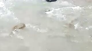 Happy to play in the river