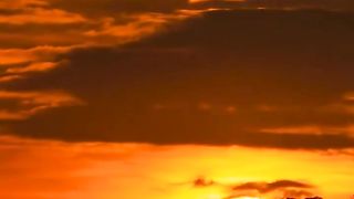 In the Orange-red clouds at dusk