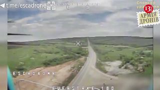 Kamikaze drone 'visits” Russians standing on roadside with military equipment