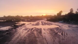 sunset in the village in Africa in the rain