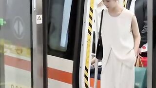Lady on off train