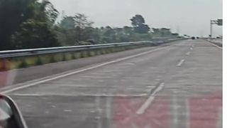 pesawat jet take off di jalan tol