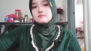 Nice girl wearing Tight green shirt