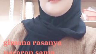 Nice girl wearing tight brown shirt