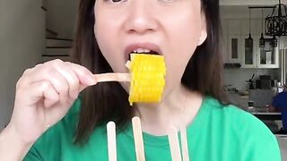 Jagung Rebus Susu Mentega / Indulge in the creaminess of boiled corn, drizzled with butter and milk - a match made in culinary heaven!