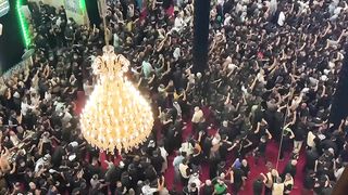 people saying labaik ya hussain in haram e Imam Hussain