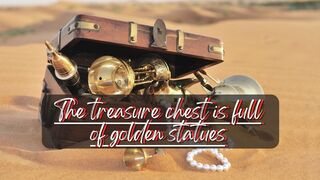 The treasure chest is full of golden statues