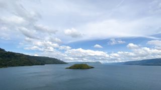 time lapse of clouds over lake toba