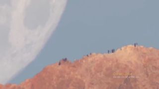 A close-up view of the moon -- مشهد للقمر عن قريب