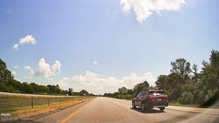 Lady changes lanes without looking and nearly runroads me off the