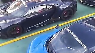 Chargement_de_voiture_de_luxe_pour_le_Gumball_