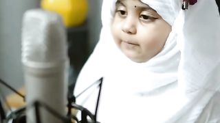 A beautiful baby girl reciting Quran in her beautiful heart touching voice