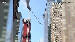 The moment an NYC crane catches fire and collapses