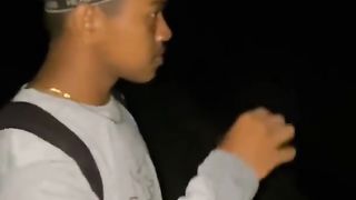 catching fish using traditional arrows at night