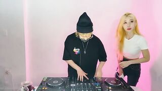 Beautiful DJ playing discs