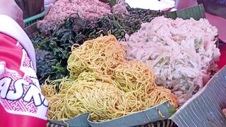 Pecel food seller at sports stadium.