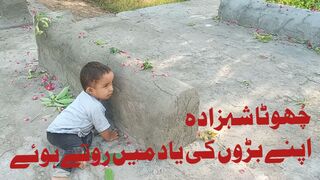 Baby crying on grave
