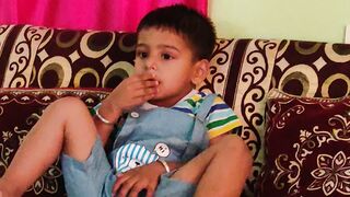 BABY PLAYING WITH ????????