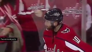 hockey player and little cheerleader (write, what would you call this video?)