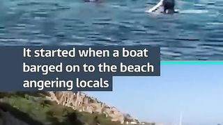 Beach tension leads to shocking flying kick #itvnews #fight.