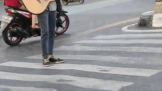 Street Musician by Ntas76