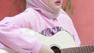 Woman Acoustic gitar player