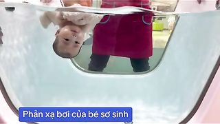 New born baby train to swim