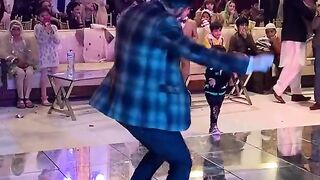 Men dance wedding hall program
