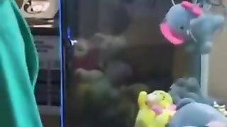 Cat coming out of the prize exit.