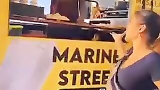 Beautiful girl dancing at the road