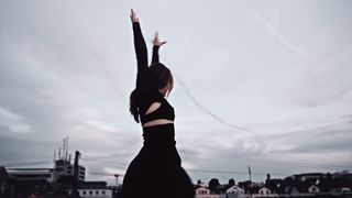 Woman, Dancing, Rooftop, Looking At Camera 2