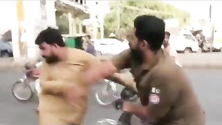 A POLICE MAN ABUSING REPORTER AND HIS OWN IG POLICE TOO