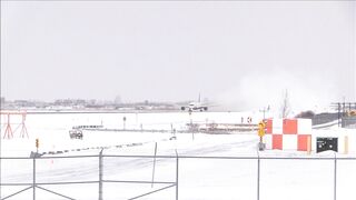 A Commercial Airplane Taking Off From The Runway of Montreal Airport