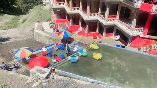 beautifull view of hotel and waterfall play aria