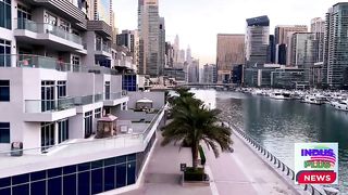 What are the five best countries in the world to work and live in, including Bahrain and Malaysia?