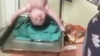 Newborn Baby took a surgical tray