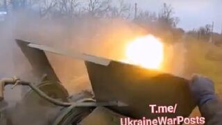 Ukrainian servicewoman lays into Russian targets using an AA gun on the frontline