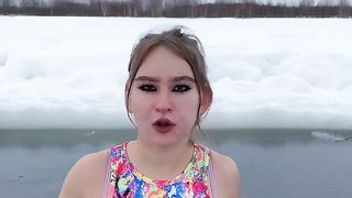Beautiful girl enjoying in cold water