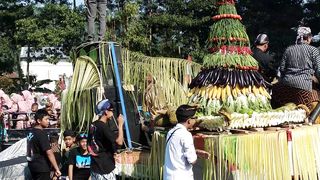 offering mountains of vegetables in order to celebrate the village