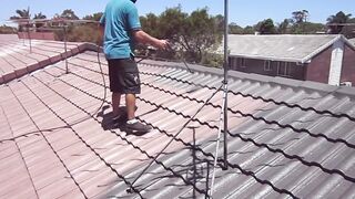 Spray Painting a Residential Roof - QPaint Brisbane Painter