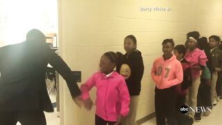 Teacher has good hand shake with each student