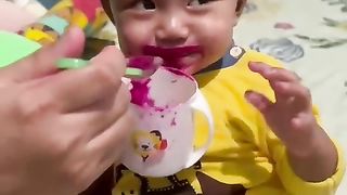 Little boy eating ????