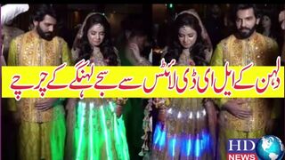 Pakistani Bride 'Shines Bright' in LED Lehenga Lens | hdnewskharian