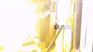 Ukrainian soldier launching a Javelin ATGM from a building